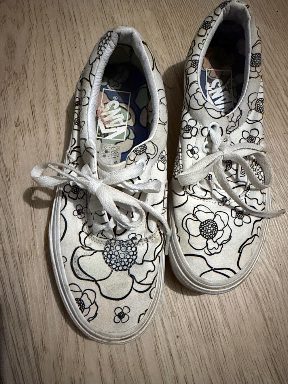 Vans Kids White Sneakers with Black Floral Print